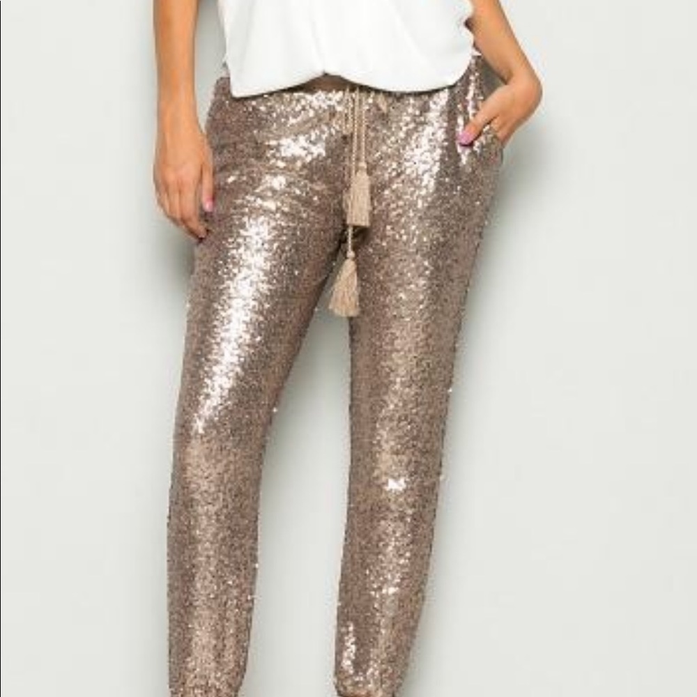 Gold sequin joggers size L.